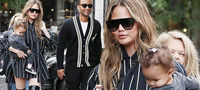 chrissy-teigen-john-legend-i-luna-stilsko-semejstvo-na-dozdliv-den-vo-london-povekje.jpg