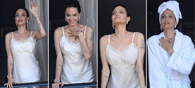 angelina-jolie-pozira-vo-neglizhe-i-banjarka-na-balkon-vo-pariz-foto-povekje01.jpg